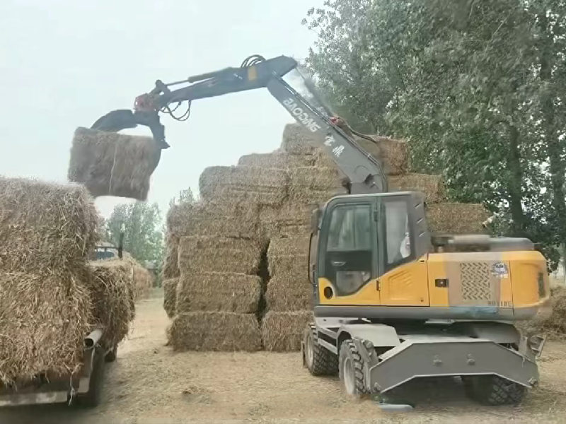 寶鼎110E抓木機(jī)憑借加長臂實(shí)現(xiàn)7層高效堆疊